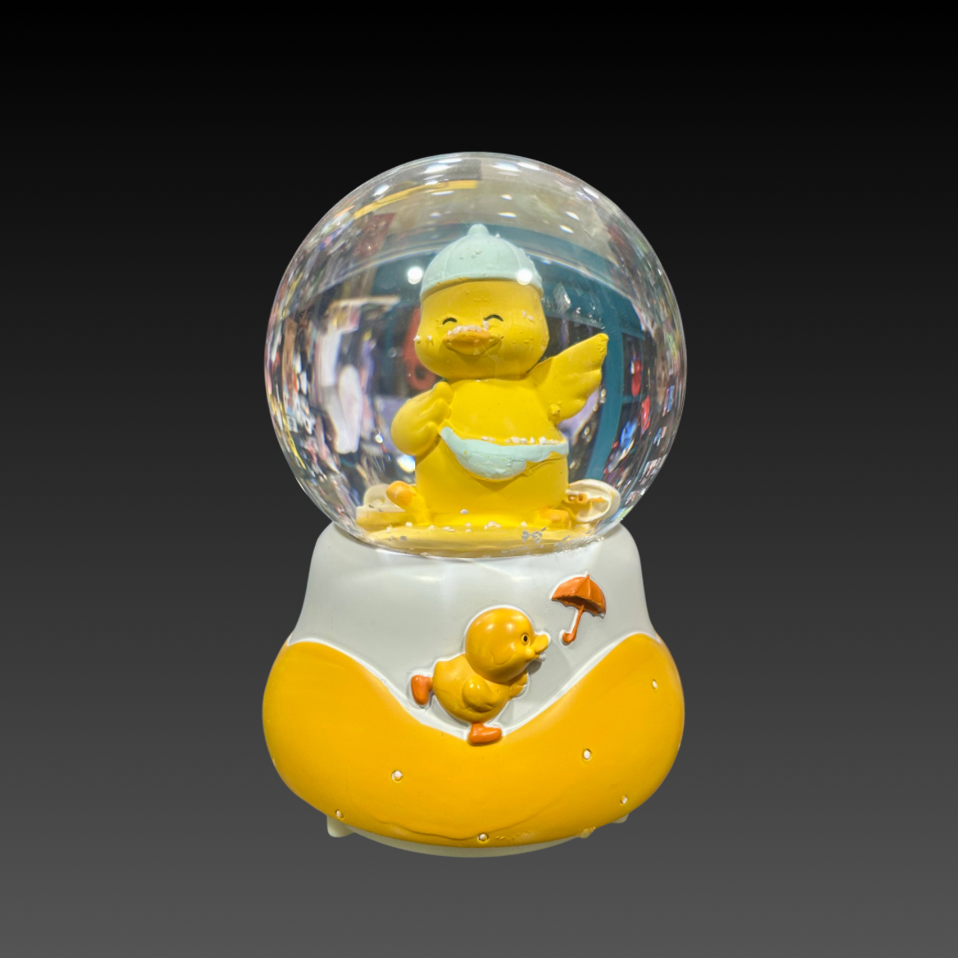 Boule à Neige Musicale et Lumineuse - Design Caneton Jaune Kawaii